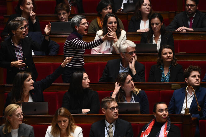 Nupes elected officials, including the Green MP for Paris Sandrine Rousseau (in the center, third row), during the session of questions to the government, at the National Assembly, in Paris, on October 4, 2022.