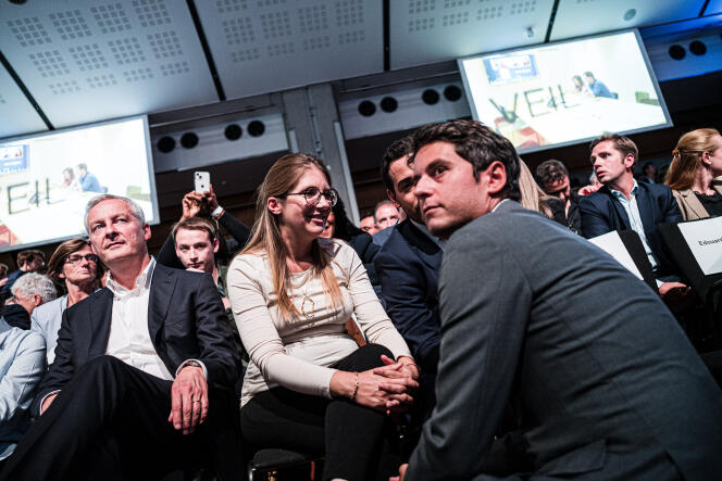The minister delegate in charge of public accounts, Gabriel Attal, discusses with the president of the Renaissance group in the National Assembly, Aurore Bergé, and the secretary general of the party, Stéphane Séjourné, during the congress of the presidential party, in Paris, on September 17 2022.