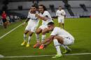 Marseille's players celebrate their side's second goal during the Champions League group D soccer match between Marseille and Sporting at the Velodrome stadium in Marseille, southern France, Tuesday, Oct. 4, 2022. (AP Photo/Daniel Cole)