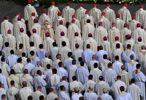 Cardinals and bishops participate to the canonisation mass of beates Giovanni Battista Scalabrini and Artemide Zatti, presided by Pope Francis at the Vatican on October 9, 2022. (Photo by Vincenzo PINTO / AFP)