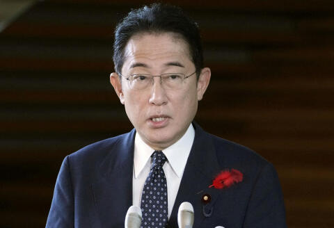 FILE PHOTO: Japan's Prime Minister Fumio Kishida speaks to the media after North Korea fired a ballistic missile over Japan, at his official residence in Tokyo, Japan October 4, 2022, in this photo taken by Kyodo. Mandatory credit Kyodo via REUTERS ATTENTION EDITORS - THIS IMAGE WAS PROVIDED BY A THIRD PARTY. MANDATORY CREDIT. JAPAN OUT. NO COMMERCIAL OR EDITORIAL SALES IN JAPAN. THIS IMAGE WAS PROCESSED BY REUTERS TO ENHANCE QUALITY, AN UNPROCESSED VERSION HAS BEEN PROVIDED SEPARATELY./File Photo