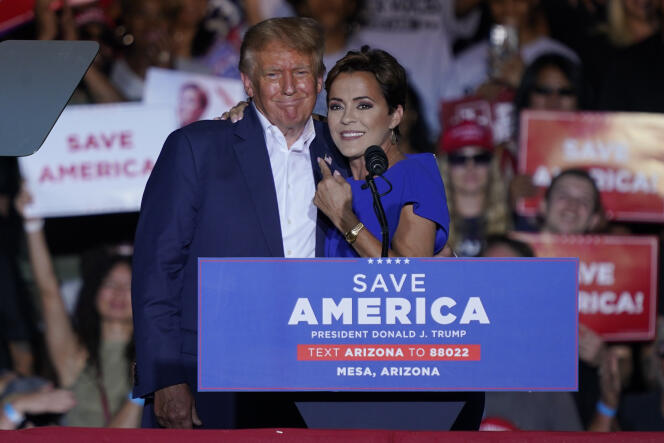 Republican candidate Kari Lake at a rally with former president Donald Trump in October 2022.