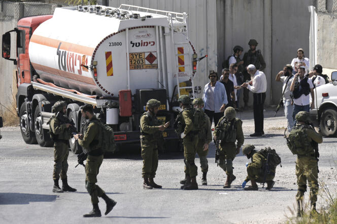 Israeli military forces near the site where a soldier was shot dead near the Jewish settlement of Shavei Shomron in the West Bank on October 11, 2022.