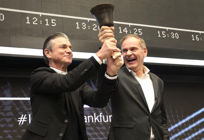 Oliver Blume, CEO of Porsche, and Lutz Meschke, member of the carmaker's board of directors, during the brand's IPO, in Frankfurt, Germany, September 29, 2022.