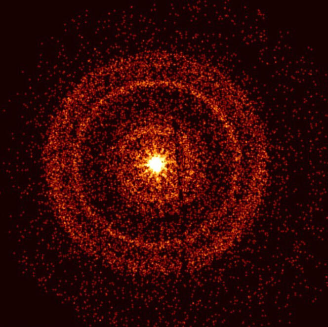 Questa immagine fornita dalla NASA il 14 ottobre 2022 mostra il telescopio a raggi X Swift che cattura il bagliore residuo di GRB 221009A circa un'ora dopo che è stato rilevato per la prima volta.  Gli anelli luminosi sono formati disperdendo i raggi X dagli strati invisibili di polvere nella nostra galassia nella direzione dell'esplosione.