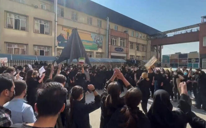 This still image from a video released on Oct. 15, 2022 shows Iranian female students gathering at the University of Science and Culture in Tehran. 