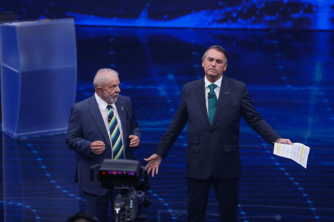 Former Brazilian head of state Lula (left) and outgoing president Jair Bolsonaro during the televised debate for the second round of the presidential election, on the Bandeirantes channel, in Sao Paulo, October 16, 2022.