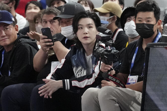 BTS member Suga attends a game between the Golden State Warriors and the Washington Wizards, two American basketball teams, on September 30, 2022, at Saitama Super Arena, north of Tokyo.