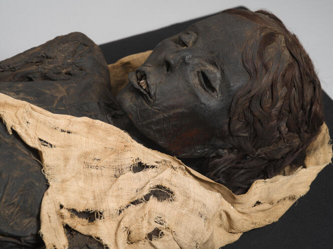 The mummy of an Egyptian woman. 