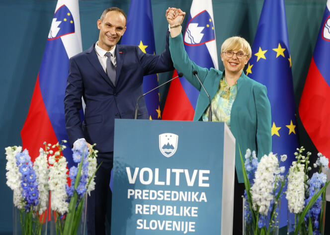 Conservative candidate Anze Logar poses with centre-left candidate Natasa Pirc Musar after the presidential election in Ljubljana, Slovenia, October 23, 2022.