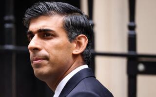 FILE PHOTO: Britain's Prime Minister Rishi Sunak walks outside Number 10 Downing Street, in London, Britain, October 26, 2022. REUTERS/Henry Nicholls/File Photo