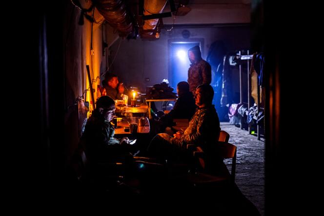 Ukrainian servicemen rest in an underground shelter in the frontline town of Bakhmut, in eastern Ukraine's Donetsk region on October 31, 2022, amid Russia's military invasion on Ukraine. 