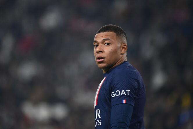 Paris Saint-Germain's French forward Kylian Mbappe looks on during the UEFA Champions League 1st round day 6 group H football match between Juventus Turin and Paris Saint-Germain (PSG) at the Juventus stadium in Turin on November 2, 2022. 
