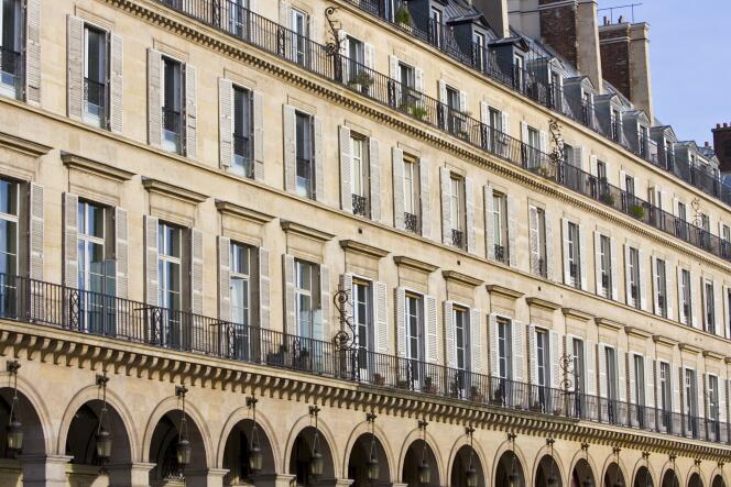 The buildings on the Rue de Rivoli, in Paris, with a view onto the Tuileries garden.