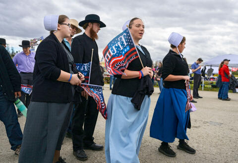 Supporters arrive for a "Save America" rally where former US President Donald Trump will speak ahead of the midterm elections, at Arnold Palmer Regional Airport in Latrobe, Pennsylvania, on November 5, 2022.