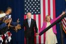 TOPSHOT - US President Joe Biden and First Lady Jill Biden arrive for a rally for gubernatorial candidate Wes Moore and the Democratic Party on the eve of the US midterm elections, at Bowie State University in Bowie, Maryland, on November 7, 2022. (Photo by Mandel NGAN / AFP)