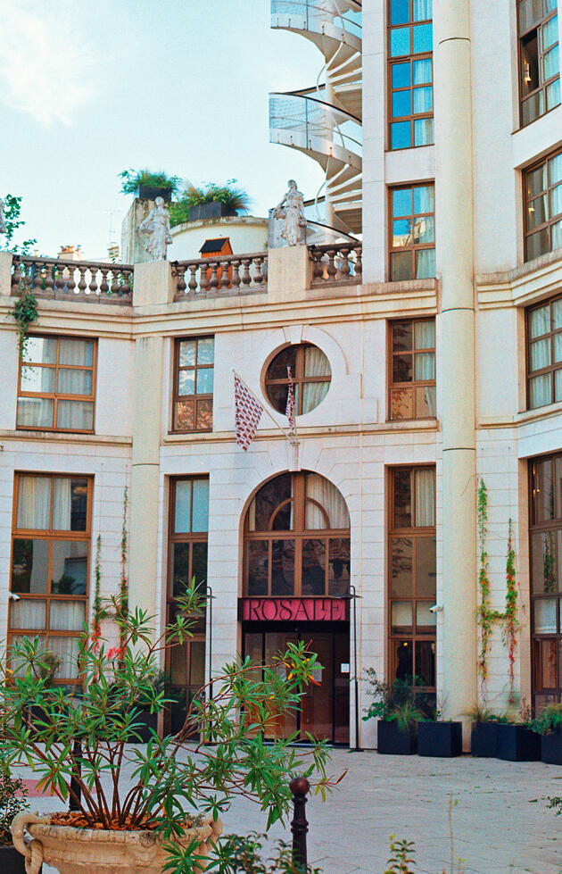 The entrance to the Hotel Rosalie is nestled in a small courtyard a stone's throw from Place d'Italie in Paris.