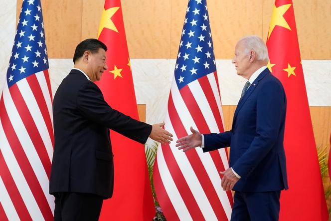 US President Joe Biden shakes hands with Chinese President Xi Jinping before their meeting on the sidelines of the G20 summit meeting, Monday, November 14, 2022, in Nusa Dua, in Bali, Indonesia.