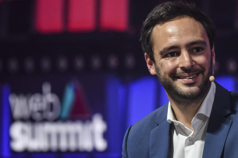 Sorare co-founder and CEO Nicolas Julia speaks during an interview on the opening day of the Web Summit in Lisbon on November 1, 2021. - Europe's largest tech event Web Summit is held at Parque das Nacoes in Lisbon from November 1 to November 4. (Photo by PATRICIA DE MELO MOREIRA / AFP)
