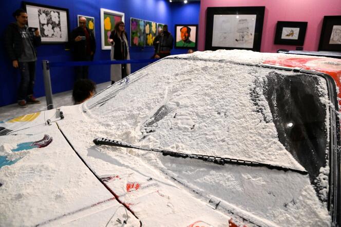 The BMW M1 painted by Andy Warhol, displayed in Milan, covered in flour by environmental activists from the group Ultima Generazione, Friday November 18, 2022.