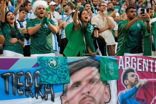 Saudi fans celebrate their team's 4-1 victory over Argentina on November 22, 2022 in Doha.