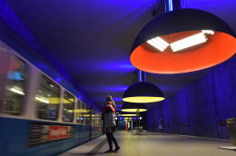 A woman waits to board a train in an underground station in Munich, southern Germany, on May 1, 2020, where public life in the city is very limited due to the coronavirus COVID-19 pandemic. (Photo by Christof STACHE / AFP)