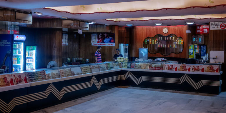 The snacks counter inside the Maratha Mandir cinema. With the prominence of swanky multiplexes, Maratha Mandir is holding on to it's old world charm