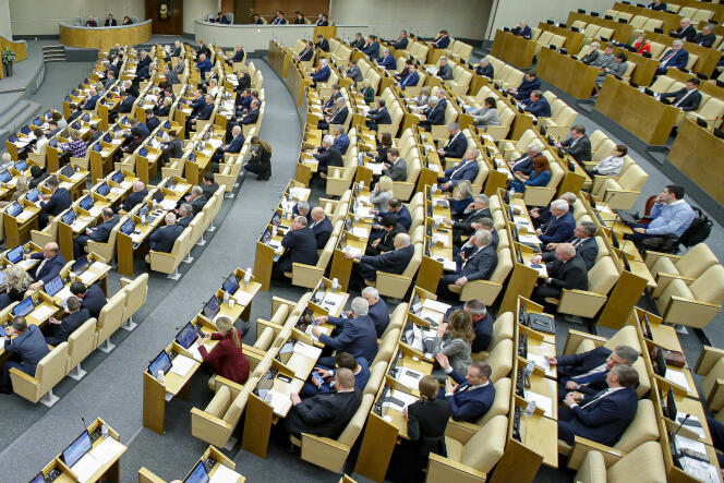 In the Duma, the lower house of the Russian parliament, Russian deputies take part in a meeting, in Moscow, Wednesday, November 23, 2022.