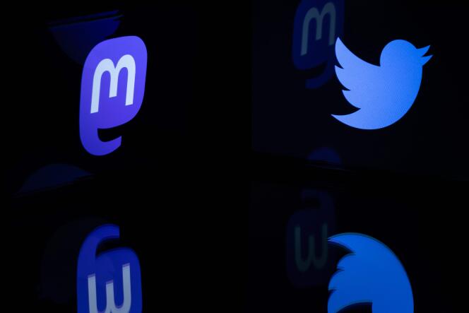 The logos of social networks Twitter and Mastodon reflected in smartphone screens, in Paris, November 7, 2022.