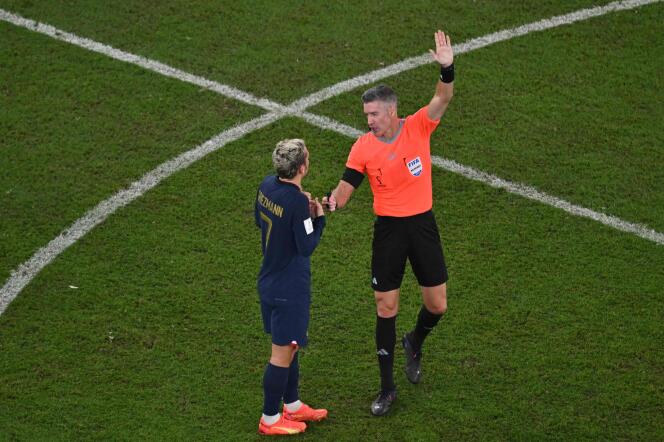 France's #07 Antoine Griezmann argues with referee Matthew Conger after scoring his team's first goal which was later disallowed after a VAR review during the Qatar 2022 World Cup Group D soccer match.