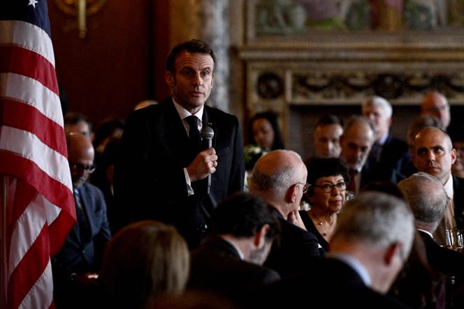  Emmanuel Macron speaks during a working lunch on climate and biodiversity issues with US Climate Envoy John Kerry, members of the United States Congress, and key US stakeholders on climate, at the US Capitol in Washington, DC, on November 30, 2022.