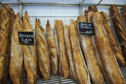 (FILES) This file photo taken on August 27, 2007, shows baguette breads on display at a bakery in Caen, western France, as bread prices in France increase due to higher wheat prices. The French baguette was given UNESCO World Heritage status on November 29, 2022, as the UN agency granted "intangible cultural heritage status" to the tradition of making the baguette and the lifestyle that surrounds them. (Photo by MYCHELE DANIAU / AFP)