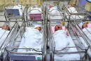 This photo taken on September 19,2022 shows newborn babies inside a ward at the Tambak Maternity hospital in Jakarta. - The global population will breach the symbolic level of 8 billion on November 15, according to the UN. The milestone comes as questions are increasingly being raised about the measures needed to adapt to global warming, as well as about how humanity consumes Earth’s resources. (Photo by Adek BERRY / AFP)