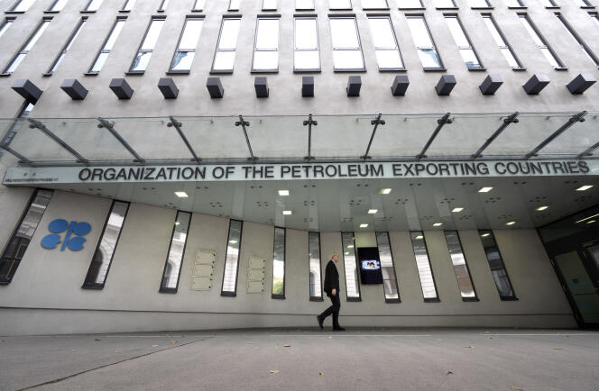 A man walks past the OPEC headquarters on October 4, 2022 in Vienna, Austria.