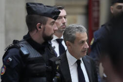 Nicolas Sarkozy arrive au tribunal pour son procès en appel pour tentative de corruption, à Paris,  le 5 décembre 2022 . 