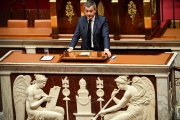 French Interior and Overseas Minister Gerald Darmanin makes a statement on immigration policy at the National Assembly in Paris, Dec. 6, 2022.