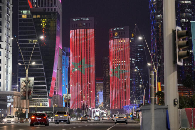 The Moroccan flag is projected on towers in Doha, after Morocco's victory over Spain in the round of 16 on December 6, 2022. 