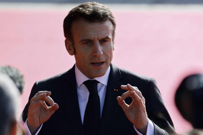 French President Emmanuel Macron makes a statement as he arrives for the EU-Western Balkans summit in Tirana, on December 6, 2022. 