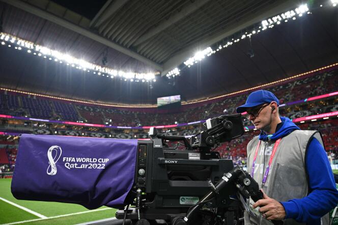 A journalist broadcasts pictures during the France-Morocco semi-final at Al Beit Stadium in Al Khor, Qatar, December 14, 2022.
