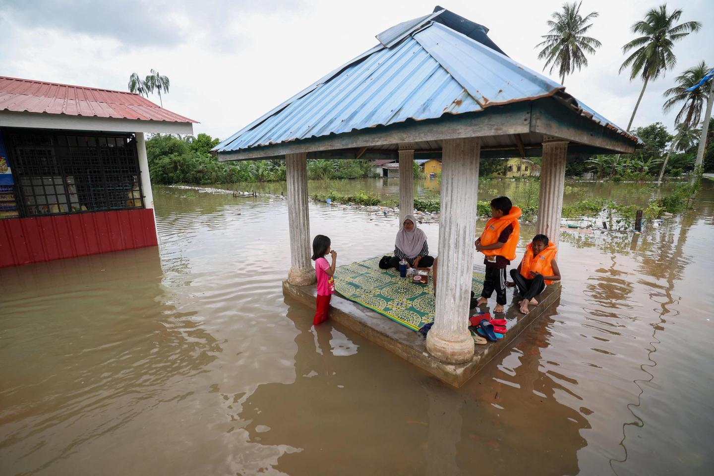 Malaysia floods leave at least five dead, force over 70,000 to evacuate