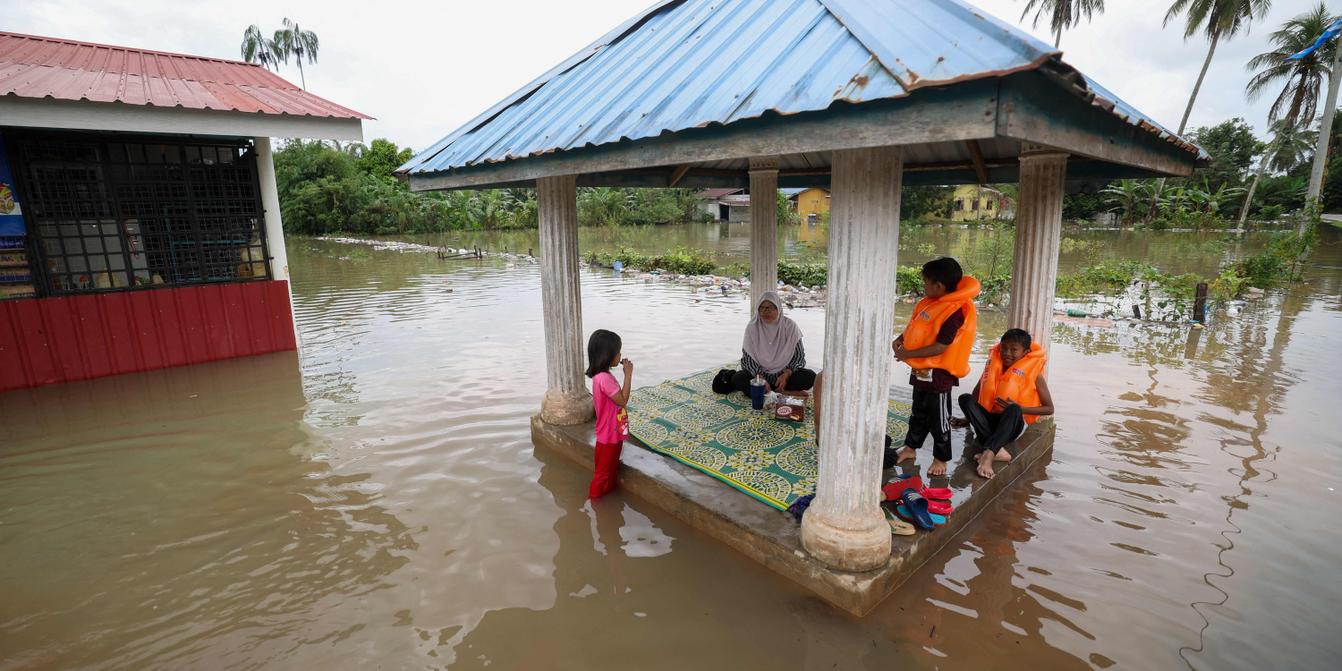 Malaysia floods leave at least five dead, force over 70,000 to evacuate