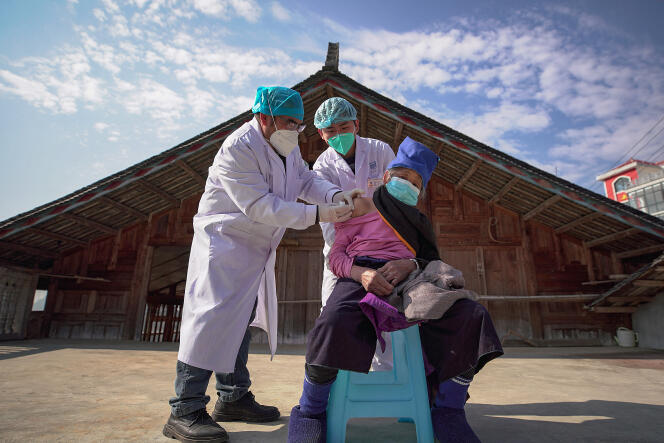 An elderly woman received a dose of the Covid-19 vaccine in Guizhou province on December 21.