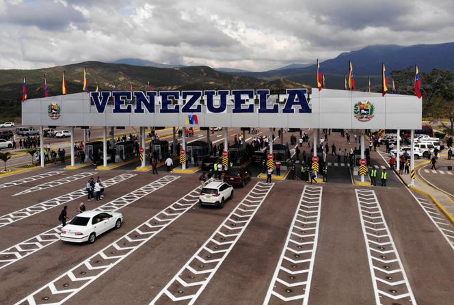 Aerial view showing vehicles arriving from Cucuta, Colombia, in Urena, in Venezuela, after crossing the Atanasio Girardot International Bridge, formerly known as Tienditas bridge, after the two countries officially reopened their shared land border, on January 1, 2023. 