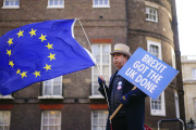 An anti-Brexit protester, in front of Lancaster House in London, January 9, 2023.