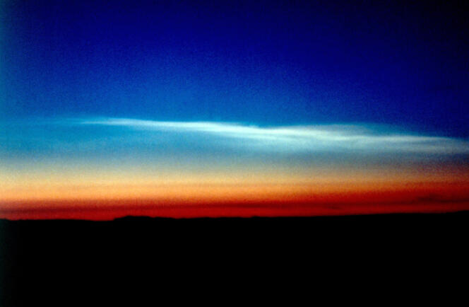 Type I and II polar stratospheric clouds are observed from the NASA DC-8 research aircraft at an altitude of 15,300 m.