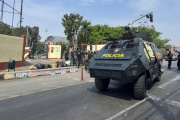 Police forces enter the National University of San Marcos in Lima on January 21, 2023.