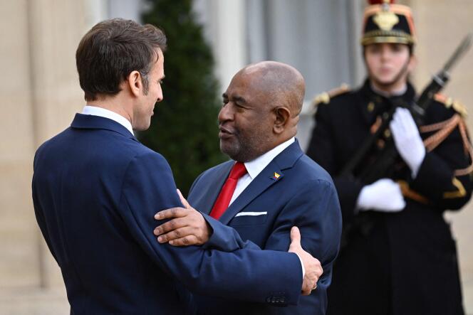 Emmanuel Macron greets the President of the Comoros, Azali Assoumani, at the Elysee Palace, in Paris, on January 11, 2023.  