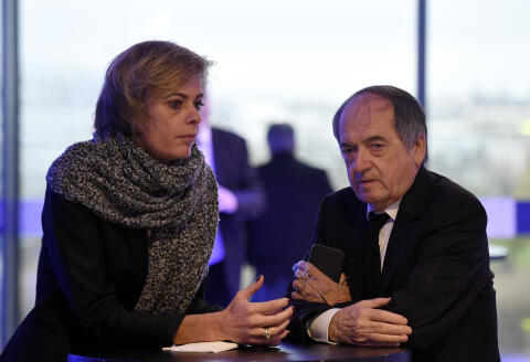 French president of the French Football Federation (FFF), Noel Le Graet (R), and FFF Marketing Director Florence Hardouin wait for the Federal Assembly of the organisation on December 12, 2015 in Paris. - The announcement by French Football Federation president Noel Le Graet on Thursday that Real Madrid striker Benzema was suspended indefinitely from the France set-up has left national coach Didier Deschamps to focus on other options in attack in the build-up to the opening game on June 10 (Photo by FRANCK FIFE / AFP)