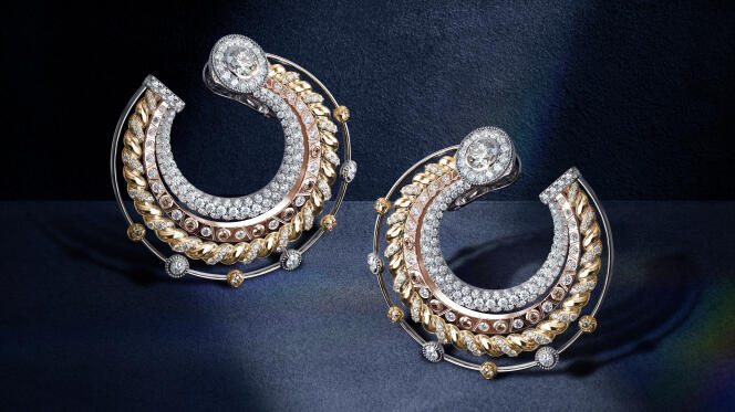 Prelude, Metamorphosis by De Beers hoop earrings in 18K white, pink and yellow gold, set with white, brown and yellow diamonds.