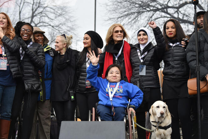 Gloria Steinem (red scarf) and other activists at the Women's March on Washington, January 21, 2017.